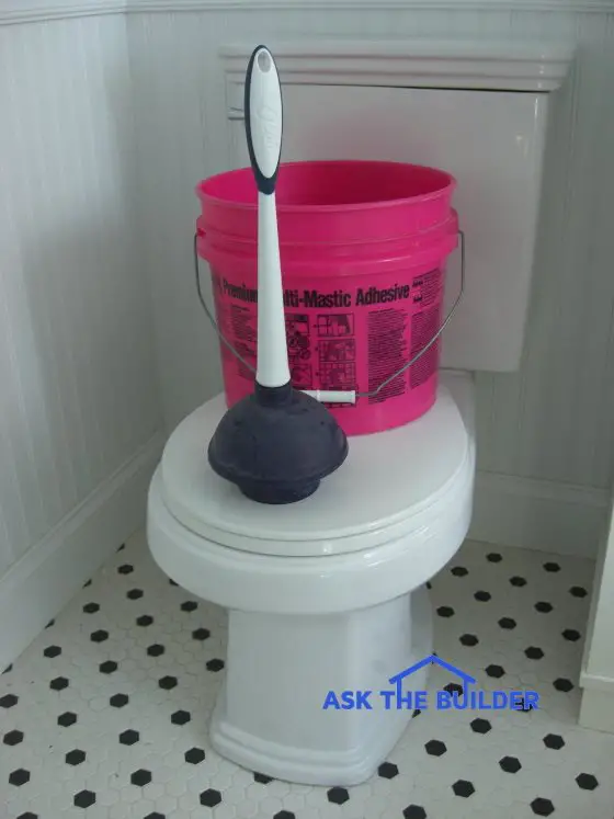tool used to unclog toilet